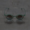 Rigards x ZIGGY CHEN RG1943ZC Titanium Magnetic Clip-On Sunglasses. RG-RG1943ZC-BLQTKTMQTL. Dark green bronze frame with dark green frame, transparent lenses, and bronze blue lenses.